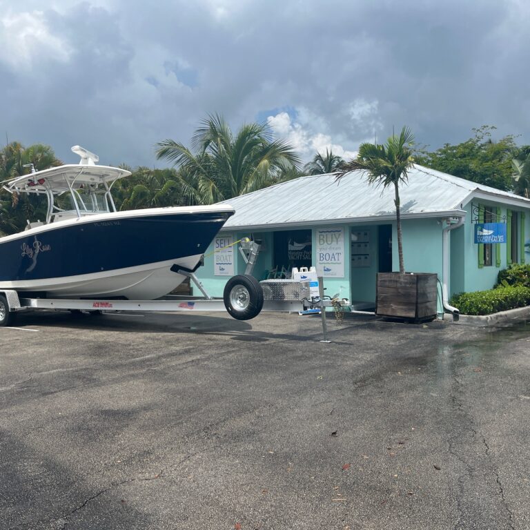 IMG_1748 Manatee Pocket Yacht Sales Office with a boat parked in front
