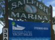 Sailfish Marina Sign and Manatee Pocket Yacht Sales Sign